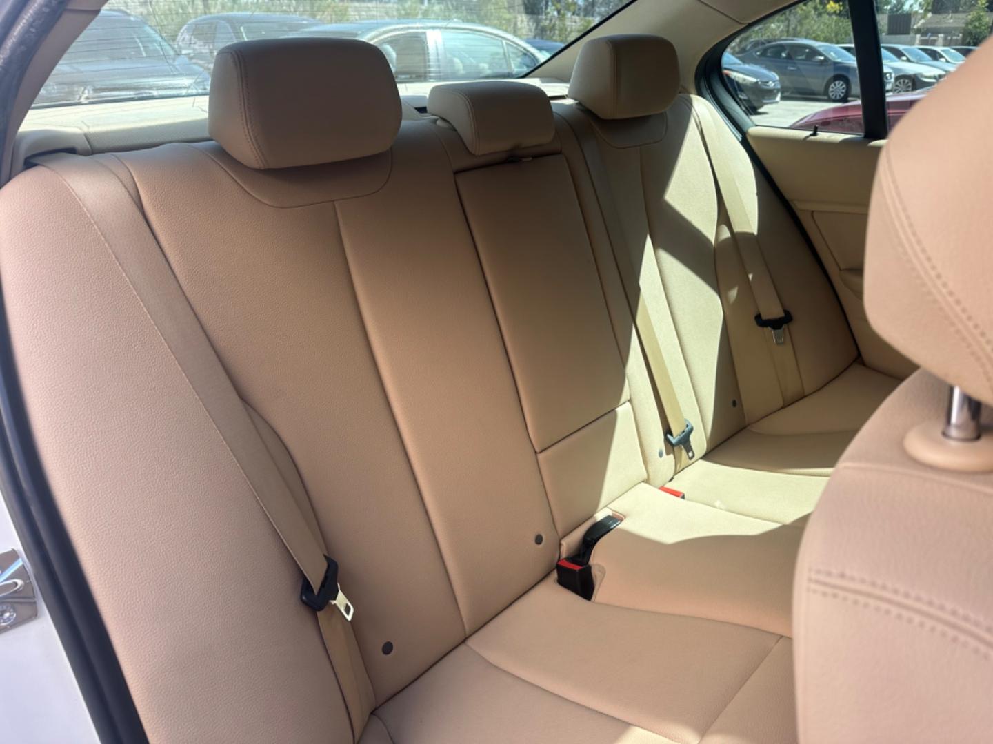 2012 WHITE /Tan BMW 3-Series Leather (WBA3C1C59CF) with an 4 Cylinder engine, Automatic transmission, located at 30 S. Berkeley Avenue, Pasadena, CA, 91107, (626) 248-7567, 34.145447, -118.109398 - Low Miles!! this 2012 BMW 3-Series 328i Sedan looks and drives well. Are you in search of a reliable and stylish vehicle in Pasadena, CA, but concerned about your credit history? Look no further! We have this impressive 2012 BMW 3-Series 328i Sedan with low miles available at our dealership. We unde - Photo#20